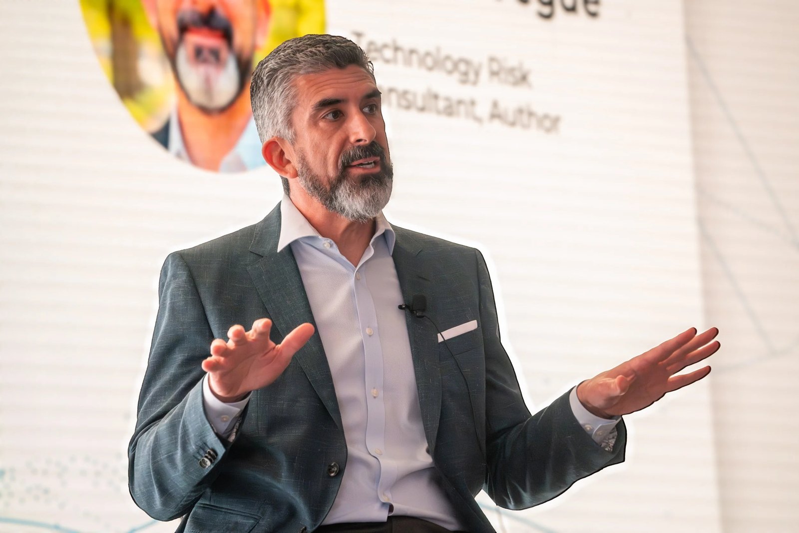 Tony Martin-Vegue speaking on a conference stage